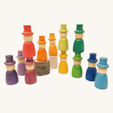 Grapat 12 Magos wooden peg dolls with top hats in a rainbow of 12 colours. These wooden toys are part of a wide range of open ended toys available at Babipur.  