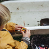 Close up of a child's holding a boat pot created using one of the gifts included in the Grapat 2026 advent calendar available at Babipur.