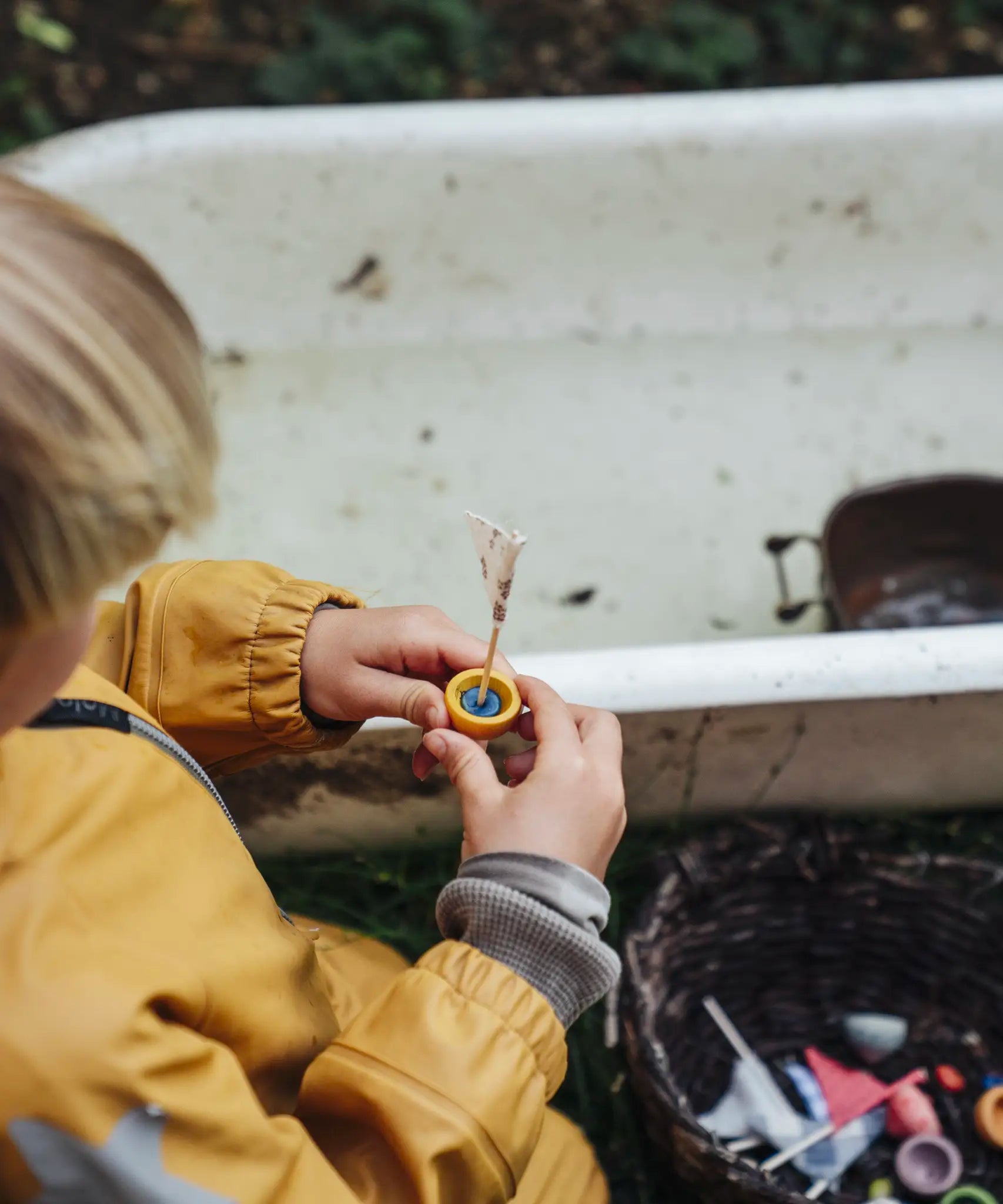 Close up of a child's holding a boat pot created using one of the gifts included in the Grapat 2026 advent calendar available at Babipur.