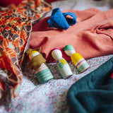 Three colourful hand painted wooden peg dolls from one of the gifts included in the Grapat 2026 advent calendar available at Babipur. 