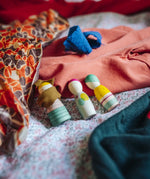 Three colourful hand painted wooden peg dolls from one of the gifts included in the Grapat 2026 advent calendar available at Babipur. 