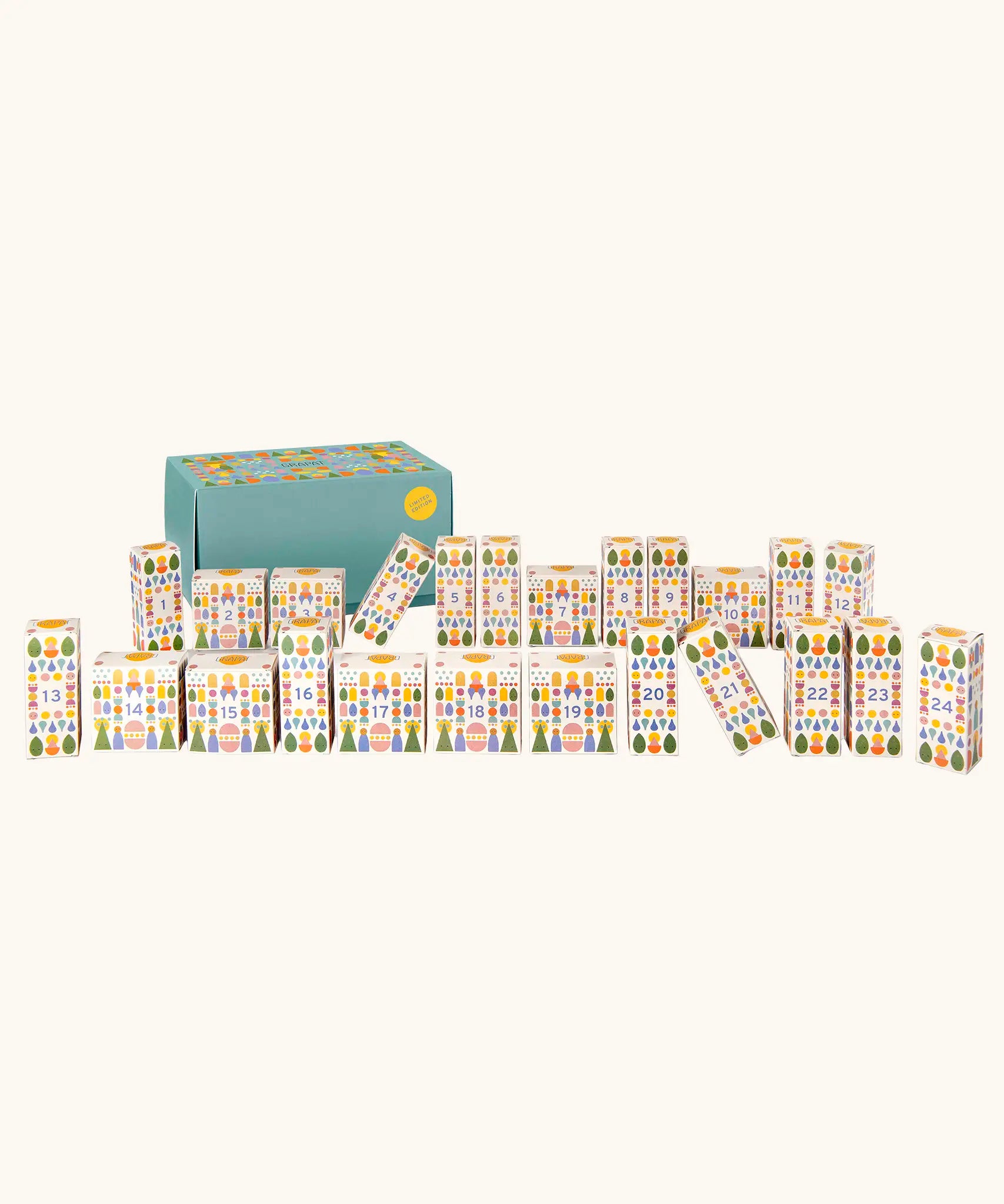 Grapat 2026 advent calendar available at Babipur. A large green box with 24 white patterned boxes filled with various wooden toys, craft kits and gifts. 