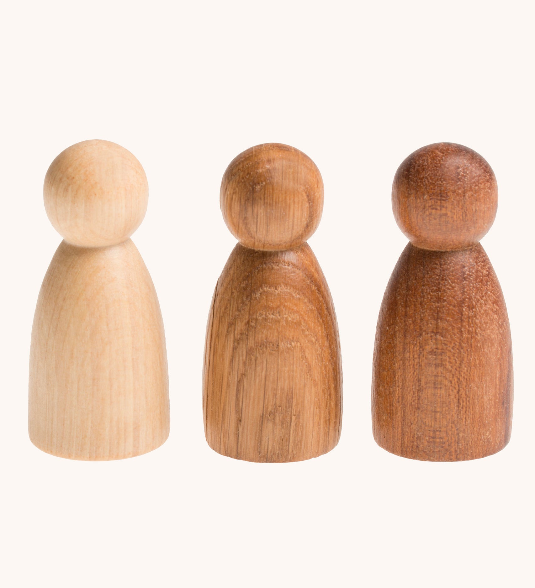 Grapat 3 Natural Nins. Three wooden peg dolls made from 3 different wood types. These wooden toys are part of a wide range of open ended toys available at Babipur.  