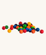Grapat set of 36 wooden marbles in a mix of 6 rainbow colours, red, orange, yellow, green, blue and purple. Grapat have a range of wooden loose parts and toys available at Babipur.