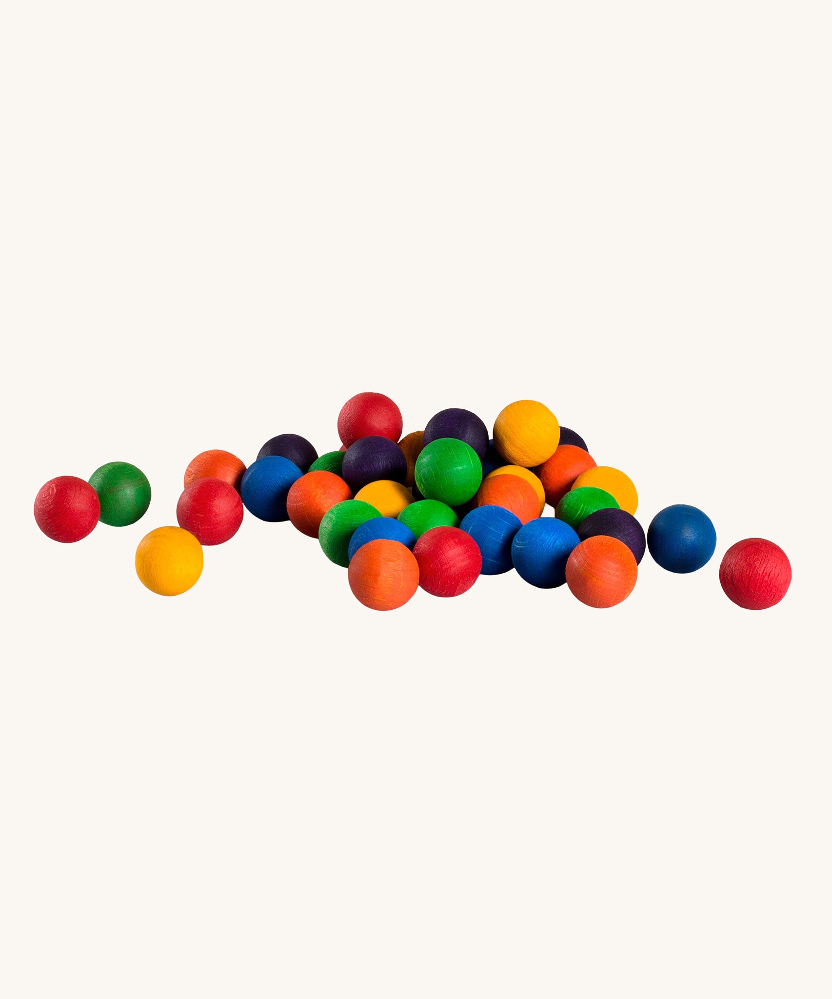 Grapat set of 36 wooden marbles in a mix of 6 rainbow colours, red, orange, yellow, green, blue and purple. Grapat have a range of wooden loose parts and toys available at Babipur.