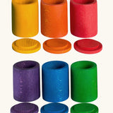 A set of 6 Grapat handcrafted wooden cups in rainbow colours with matching lids.