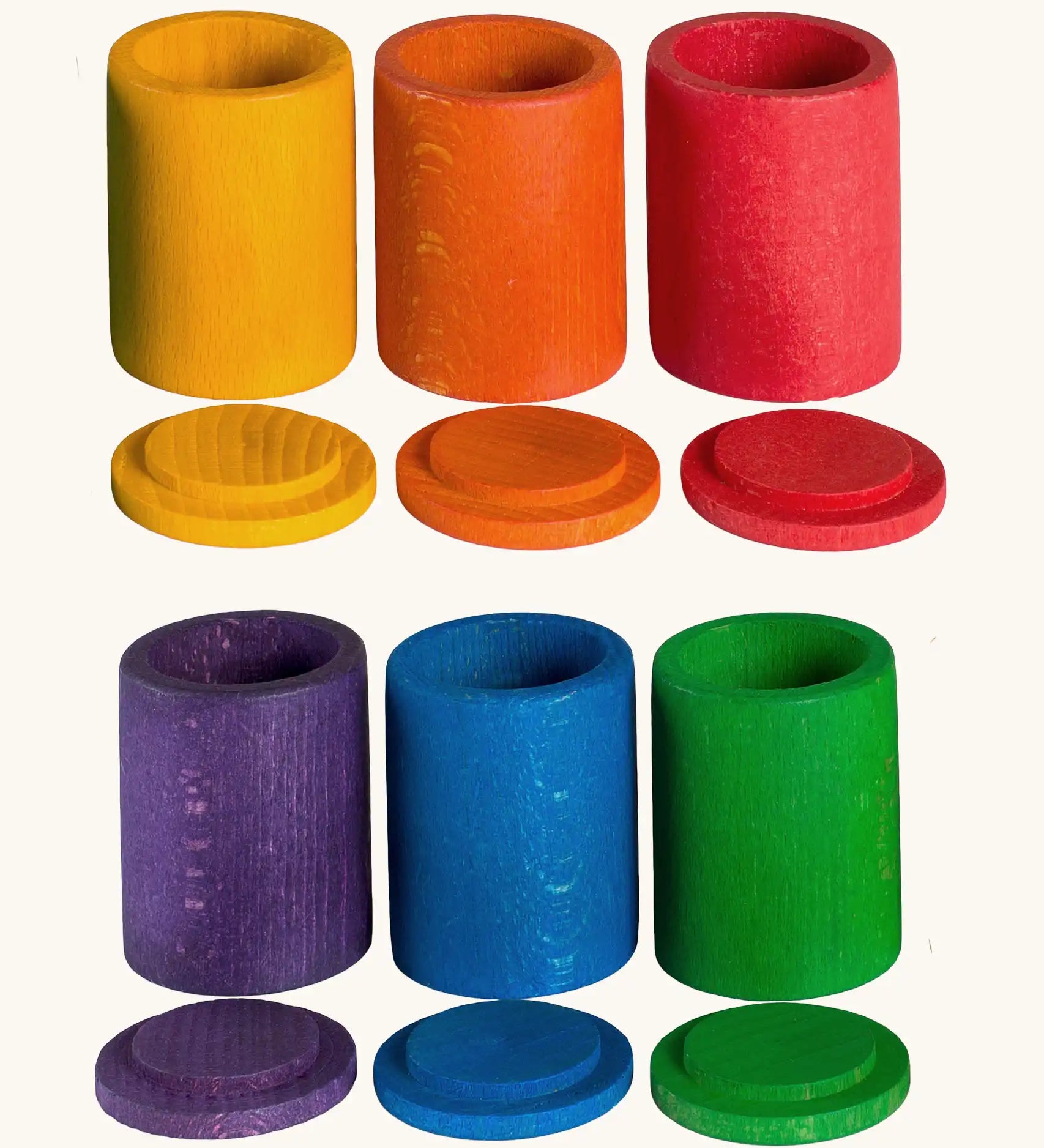A set of 6 Grapat handcrafted wooden cups in rainbow colours with matching lids.