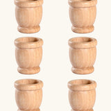 A set of six natural mates loose parts. Wooden cups to acomany other Grapat wooden loose parts and Nin peg dolls.