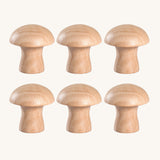 A set of 6 Grapat natural wooden mushroom loose parts. These wooden toys are part of a wide range of open ended toys available at Babipur.