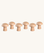 A set of 6 Grapat natural wooden mushroom loose parts. These wooden toys are part of a wide range of open ended toys available at Babipur.