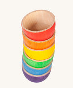 Grapat 6 Rainbow Sorting Bowls stacked up. These wooden bowls are part of a wide range of loose parts and wooden toys available here at Babipur. 