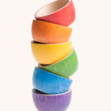 Grapat 6 Rainbow Sorting Bowls stacked up. These wooden bowls are part of a wide range of loose parts and wooden toys available here at Babipur. 