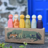 Grapat animal crew peg doll Nins placed on the illustrated cardboard box packaging. 