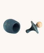 Grapat blue Little Things. A wooden top with eyes drawn on and a blue coloured pot to match. Grapat have a wide range of wooden toys and loose parts available at Babipur. 