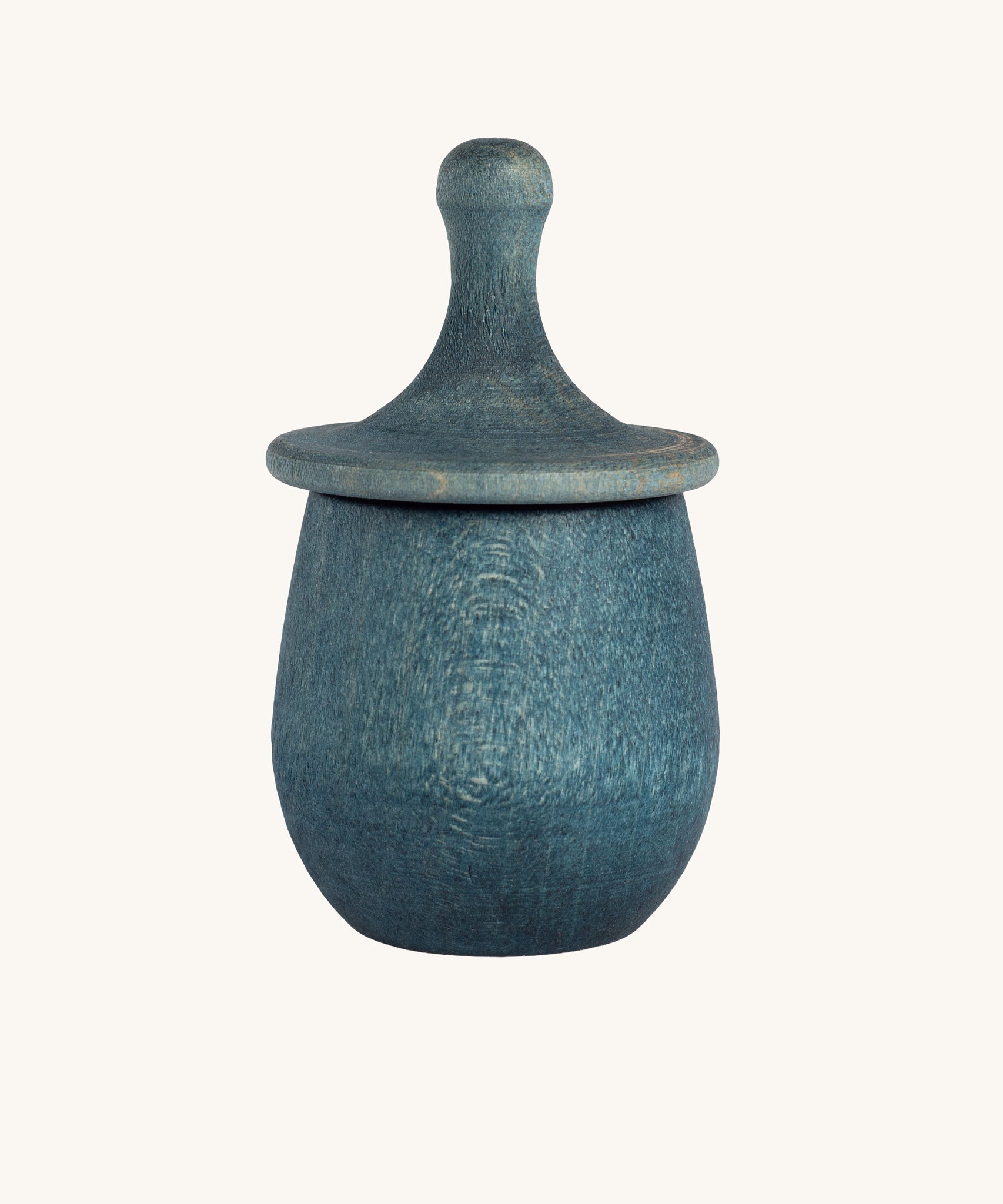 Grapat blue Little Things. A wooden top with eyes drawn on and a blue coloured pot to match. Grapat have a wide range of wooden toys and loose parts available at Babipur. 