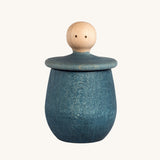 Grapat blue Little Things. A wooden top with eyes drawn on and a blue coloured pot to match. Grapat have a wide range of wooden toys and loose parts available at Babipur. 