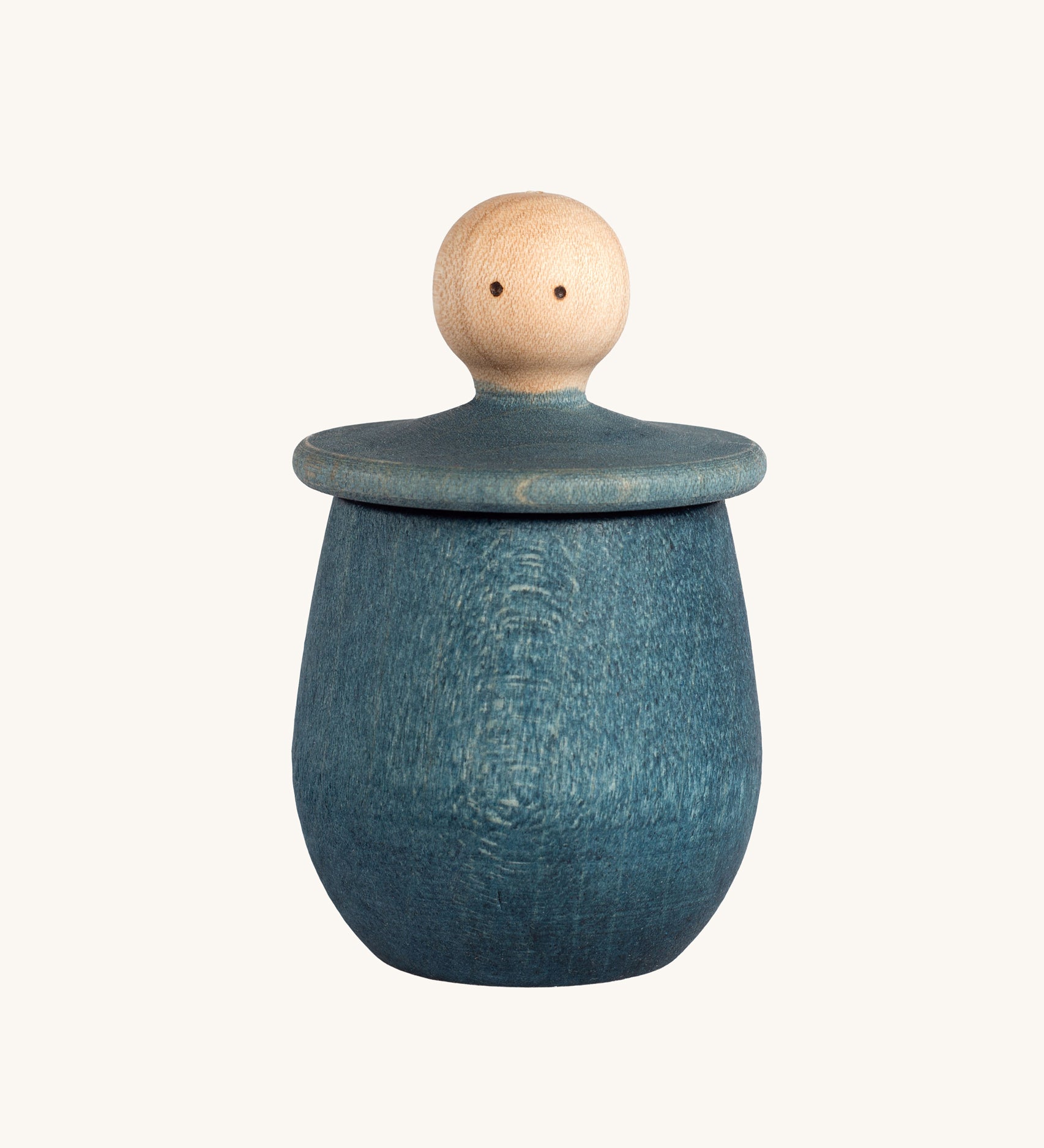 Grapat blue Little Things. A wooden top with eyes drawn on and a blue coloured pot to match. Grapat have a wide range of wooden toys and loose parts available at Babipur. 