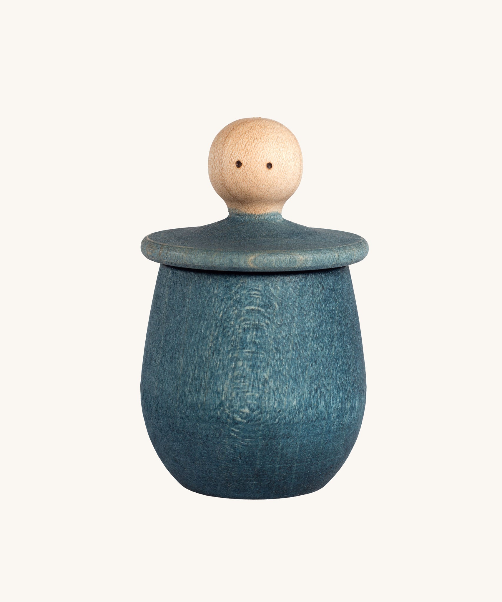 Grapat blue Little Things. A wooden top with eyes drawn on and a blue coloured pot to match. Grapat have a wide range of wooden toys and loose parts available at Babipur. 
