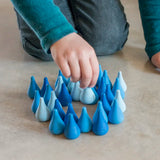 Child playing with the Grapat blue mandala raindrops.