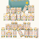 Grapat 2026 advent calendar available at Babipur. A large green box with 24 white patterned boxes filled with various wooden toys, craft kits and gifts. 