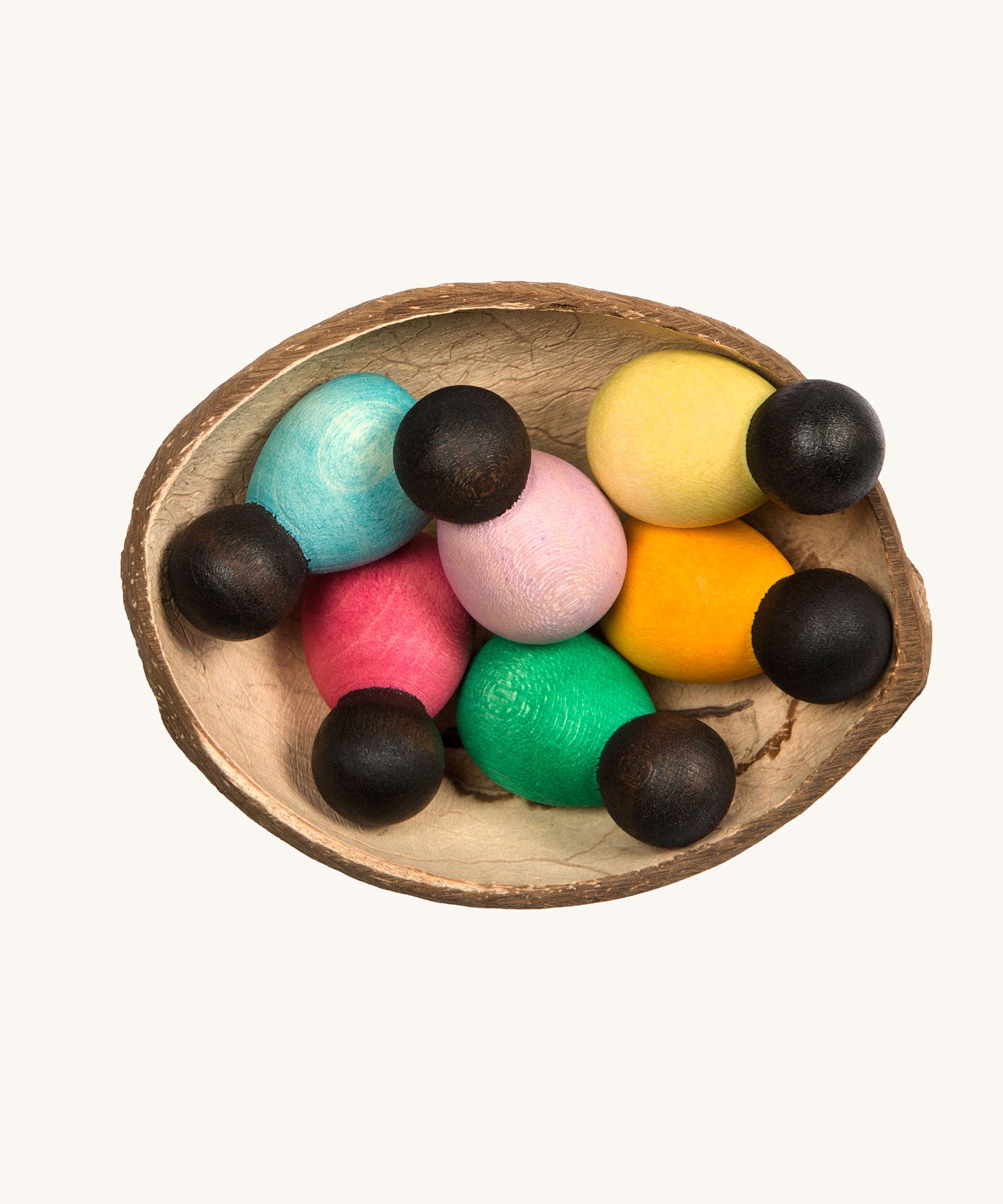 Grapat 6 Dark Baby Nins. A set of 6 small dark wooden baby Nin peg dolls in half a coconut shell. Grapat have a wide range of wooden toys and loose parts available at Babipur. 