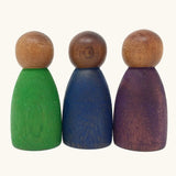 Grapat 3 Nins in dark wood with cold colour outfits wooden peg dolls. 