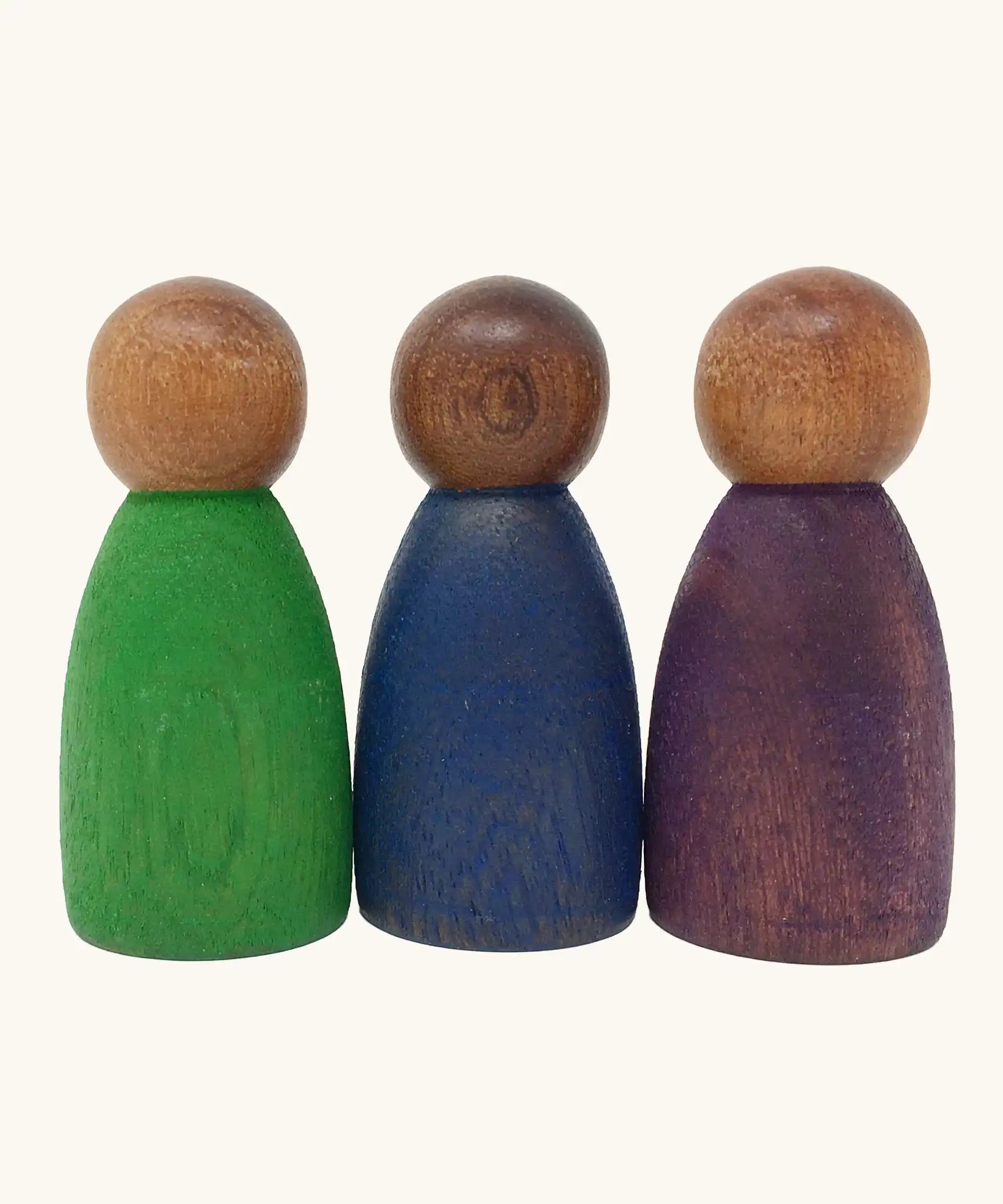 Grapat 3 Nins in dark wood with cold colour outfits wooden peg dolls. 