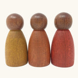 Grapat dark wood peg dolls Nins with warm colour tone. 