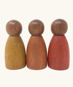 Grapat dark wood peg dolls Nins with warm colour tone. 