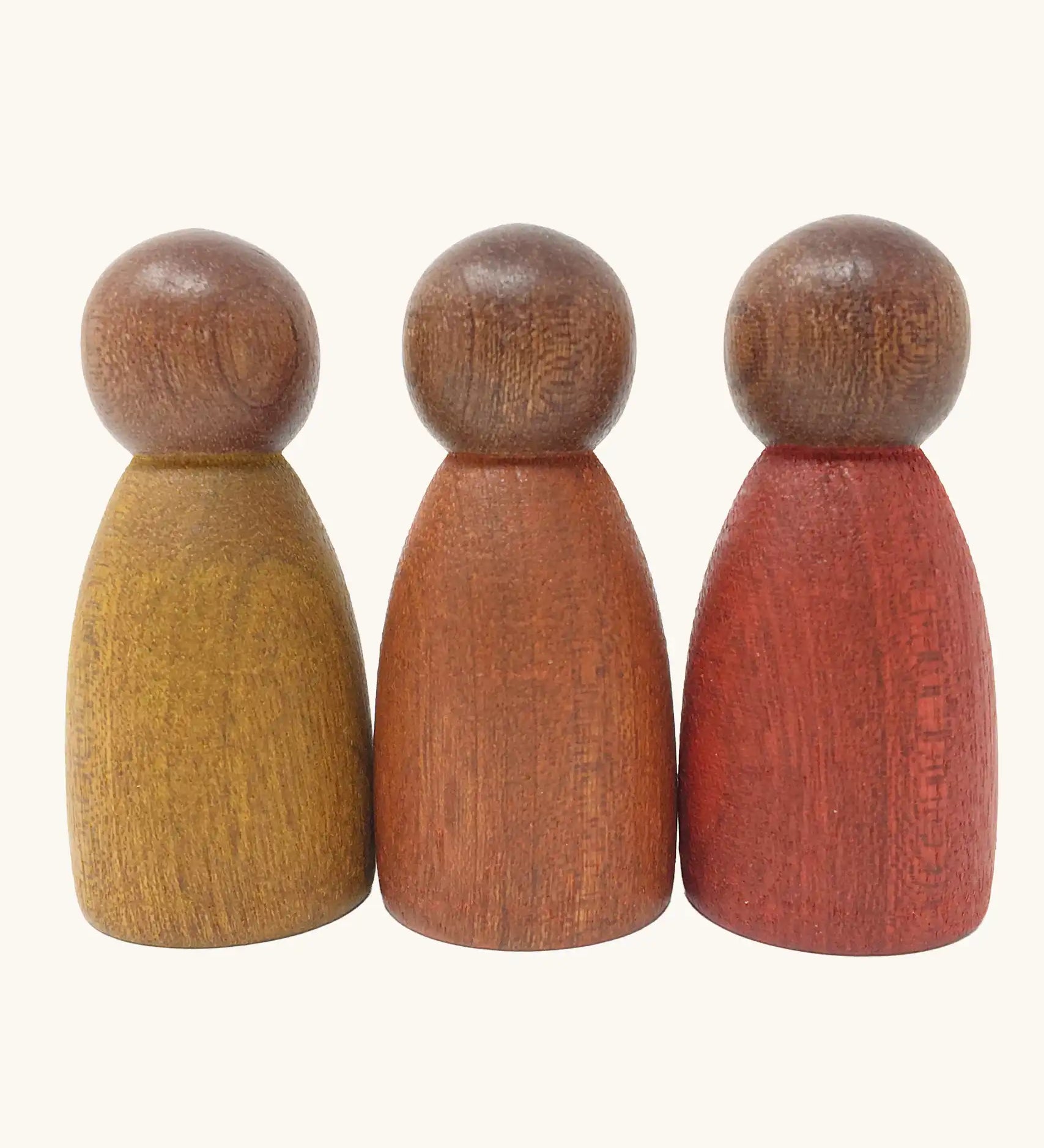 Grapat dark wood peg dolls Nins with warm colour tone. 