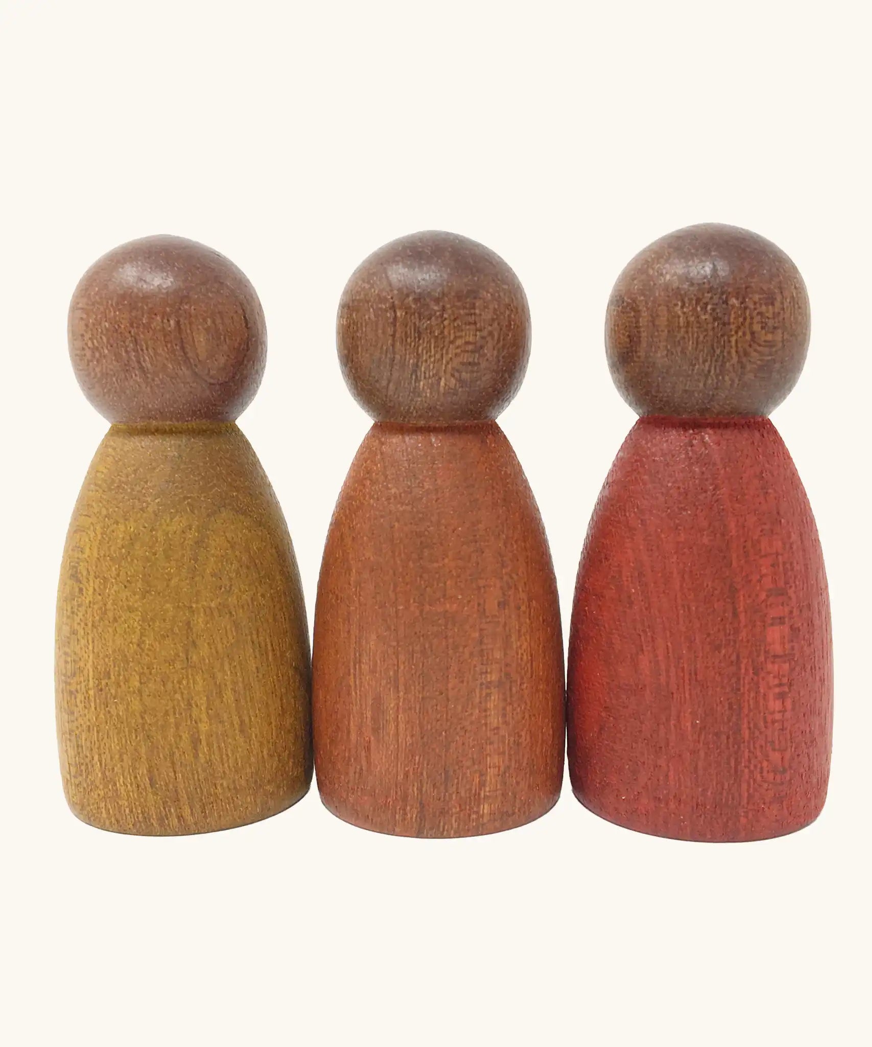 Grapat dark wood peg dolls Nins with warm colour tone. 