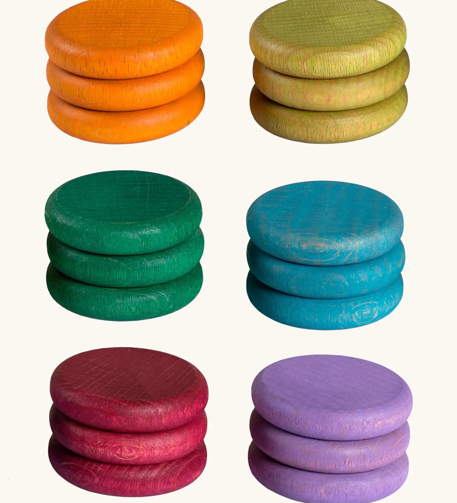 18 Grapat hand crafted wooden loose coins in earth inspired tones.