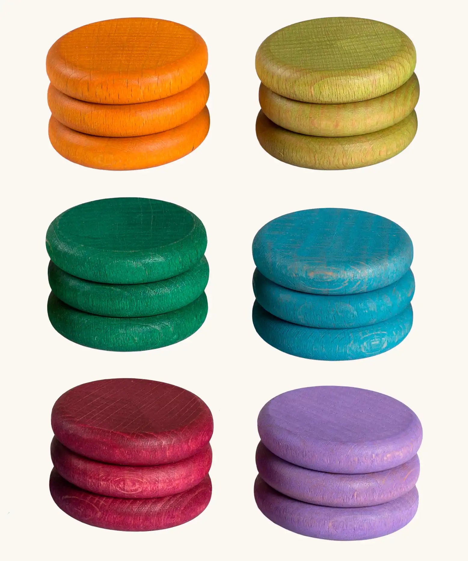 18 Grapat hand crafted wooden loose coins in earth inspired tones.