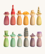 Grapat Fancy Nins Play Set. A set of 12 colourful wooden peg dolls with removable hats. 