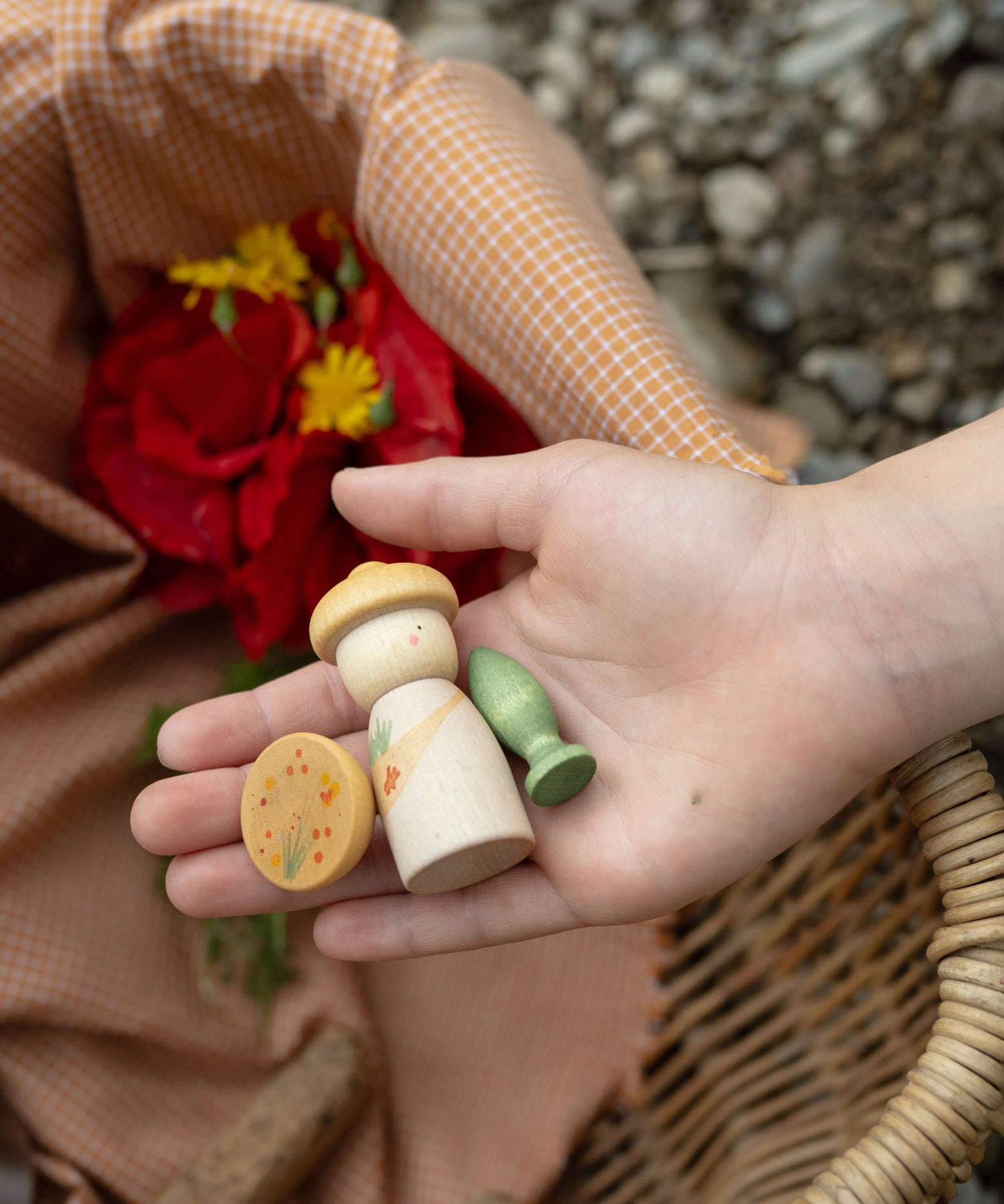 A close up of the flowers inspired woode pieces from the Grapat lucky lucky box showing the delicate painted detail