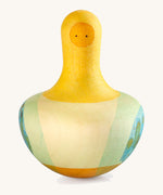 Grapat yellow flowing bird - A vibrant tactile wooden yellow wobbly bird with hand painted small face with light green and blue feathers 