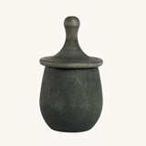 Grapat green Little Things. A wooden top with eyes drawn on and a green coloured pot to match. Grapat have a wide range of wooden toys and loose parts available at Babipur. 