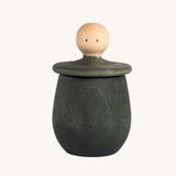 Grapat green Little Things. A wooden top with eyes drawn on and a green coloured pot to match. Grapat have a wide range of wooden toys and loose parts available at Babipur. 