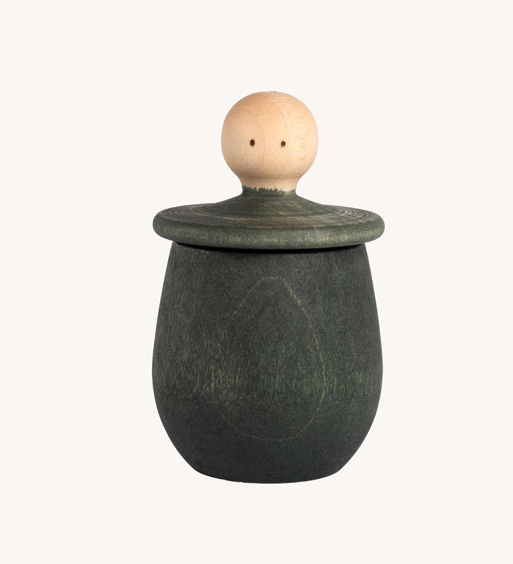 Grapat green Little Things. A wooden top with eyes drawn on and a green coloured pot to match. Grapat have a wide range of wooden toys and loose parts available at Babipur. 