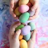 Grapat Happy Eggs wooden toys in children's hands. 