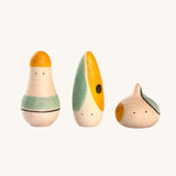 The Grapat Hooray! Set. A set of three wooden toy figures hand painted with green, yellow and black details.