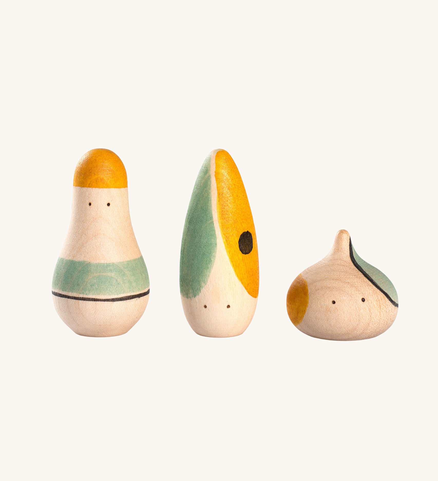 The Grapat Hooray! Set. A set of three wooden toy figures hand painted with green, yellow and black details.