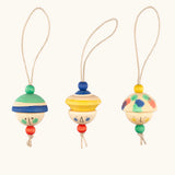 Grapat kind folk wooden Christmas ornaments hanging decorations. Three hand painted wooden decorations.