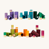 Grapat La wooden toy play set. A set that consists of cylinder and tubes. These wooden toys are part of a wide range of open ended toys available at Babipur.