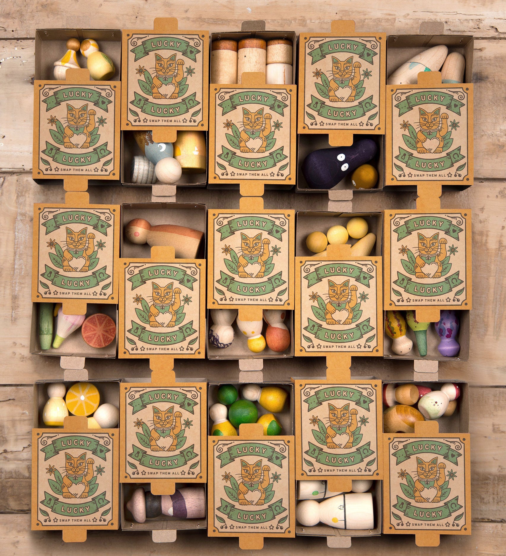 15 Grapat Lucky Lucky Surprise Box - Third Edition boxes laid out and half open to reveal contents inside. 