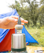 A outdoor camping setting showing the 3 space inspired wooden peg dolls and pieces from the Grapat lucky lucky boxes. Features delicate hand painted designs. 