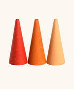 Grapat mandala orange cone wooden pieces in three different shades of orange.
