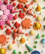 Close up of a rainbow coloured mandala created using Grapat mandala pieces.