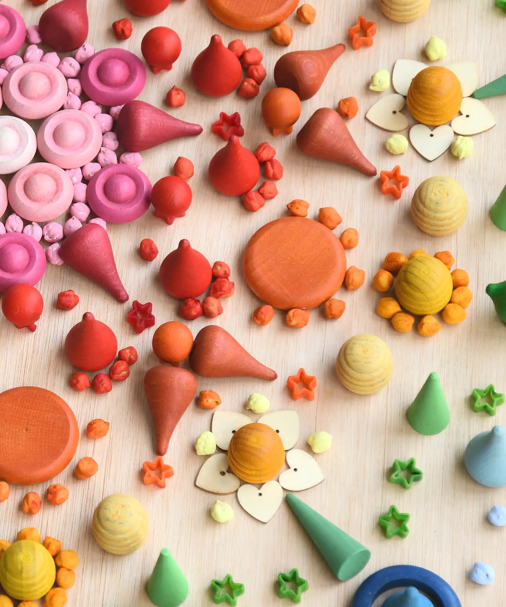 Close up of a rainbow coloured mandala created using Grapat mandala pieces.