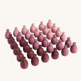 Grapat 36x Mandala Pineapples. 36 pineapple shaped mandala pieces in three shades of purple, 12 in each colour. Grapat have a wide range of wooden toys and loose parts available at Babipur. 